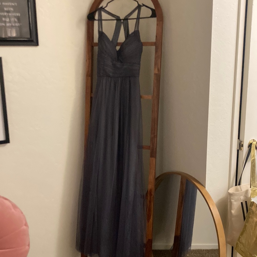 Floor length tulle grey dress. Size 0, but fits like a small.